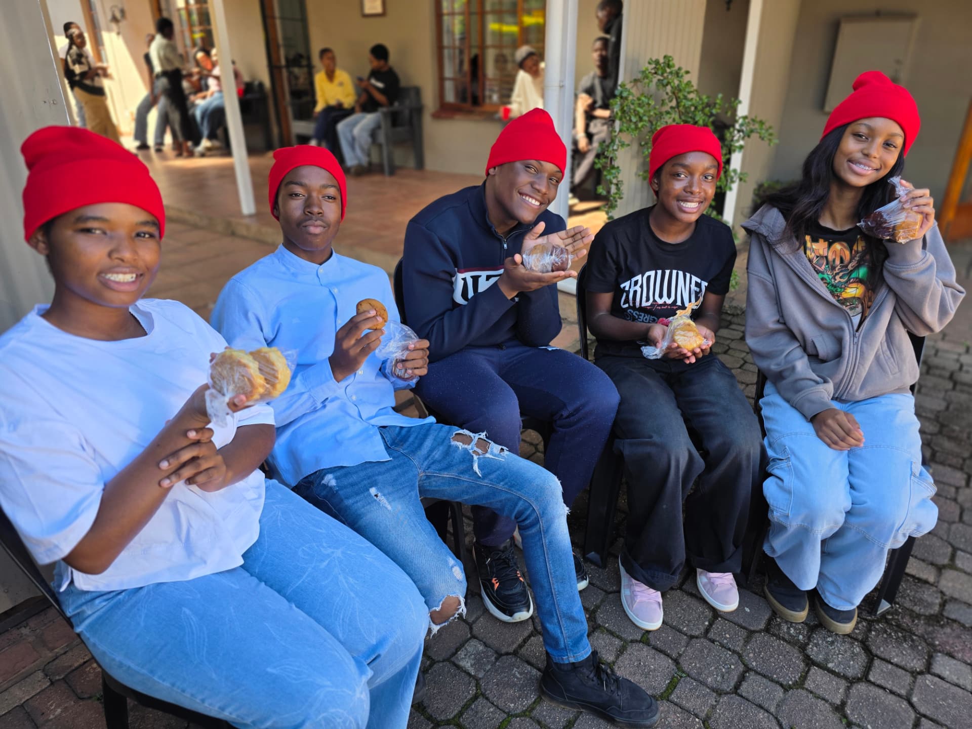 Students enjoying their tea-time juice, hot chocolate and home-baked treats funded by the Datatec Educational & Technology Foundation
